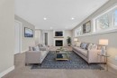 74 Riverpark Boulevard West, Lethbridge, AB  - Indoor Photo Showing Living Room With Fireplace 