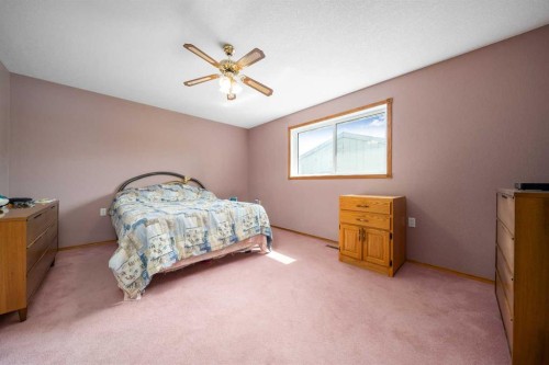 5205 55 Street, Taber, AB - Indoor Photo Showing Bedroom