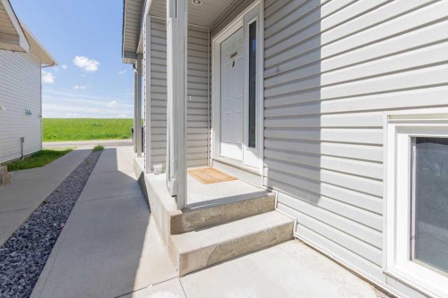 1-4406 Lake Drive, Coalhurst, AB - Outdoor With Exterior