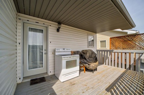 571 Blackfoot Manor West, Lethbridge, AB - Outdoor With Deck Patio Veranda With Exterior