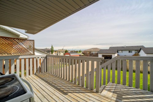 571 Blackfoot Manor West, Lethbridge, AB - Outdoor With Deck Patio Veranda With Exterior