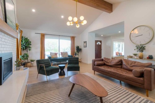80 Lafayette Boulevard West, Lethbridge, AB - Indoor Photo Showing Living Room With Fireplace