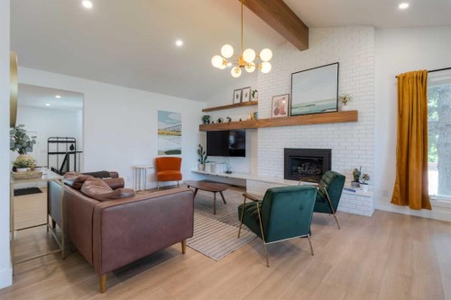 80 Lafayette Boulevard West, Lethbridge, AB - Indoor Photo Showing Living Room With Fireplace