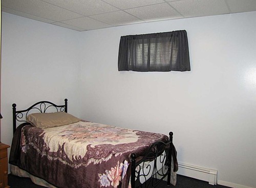 4923 52 Avenue, Taber, AB - Indoor Photo Showing Bedroom