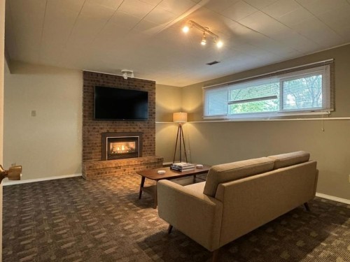 2409 20 Street North, Lethbridge, AB - Indoor With Fireplace