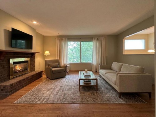 2409 20 Street North, Lethbridge, AB - Indoor Photo Showing Living Room With Fireplace