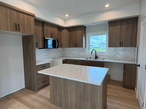 10 Meadows Way, Taber, AB - Indoor Photo Showing Kitchen
