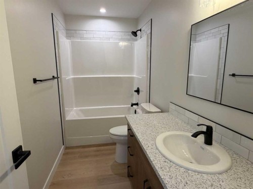 10 Meadows Way, Taber, AB - Indoor Photo Showing Bathroom