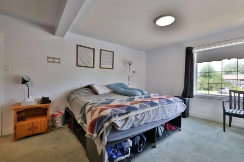 234 S 100 W, Raymond, AB - Indoor Photo Showing Bedroom