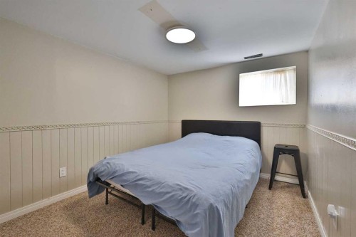 234 S 100 W, Raymond, AB - Indoor Photo Showing Bedroom