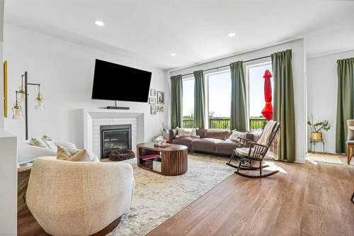 4618 31 Avenue South, Lethbridge, AB - Indoor Photo Showing Living Room With Fireplace
