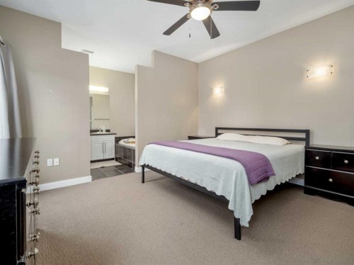 275 Mt Sunburst Way West, Lethbridge, AB - Indoor Photo Showing Bedroom