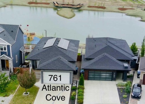 761 Atlantic Cove West, Lethbridge, AB - Outdoor With Body Of Water