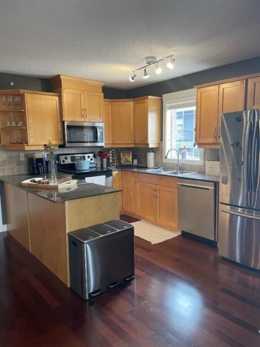 320-2233 34 Avenue Sw, Calgary, AB - Indoor Photo Showing Kitchen With Double Sink