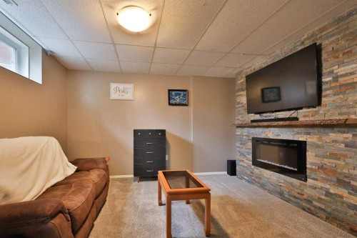 4602 6 Street, Coalhurst, AB - Indoor With Fireplace