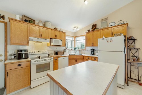 781 Red Crow Boulevard West, Lethbridge, AB - Indoor Photo Showing Kitchen With Double Sink
