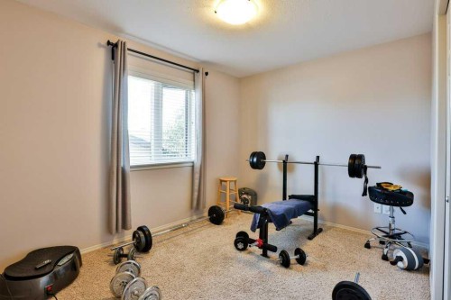 334 Keystone Lane West, Lethbridge, AB - Indoor Photo Showing Gym Room