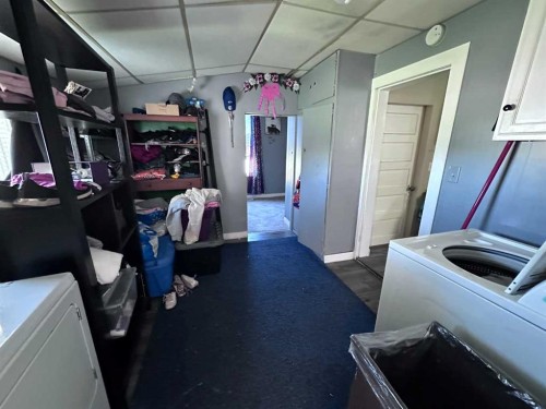 61 2 Avenue East, Cardston, AB - Indoor Photo Showing Laundry Room