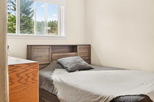 7826 22 Avenue, Coleman, AB - Indoor Photo Showing Bedroom