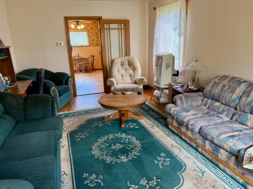 14825 21 Avenue South, Frank, AB - Indoor Photo Showing Living Room