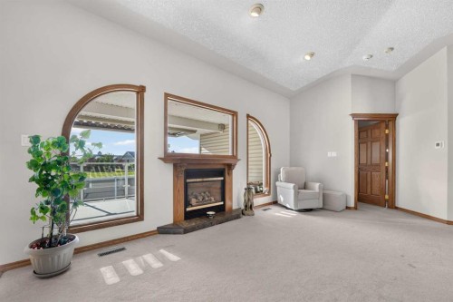 27 Cougar Bay North, Lethbridge, AB - Indoor With Fireplace
