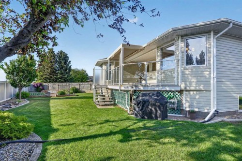 27 Cougar Bay North, Lethbridge, AB - Outdoor With Deck Patio Veranda