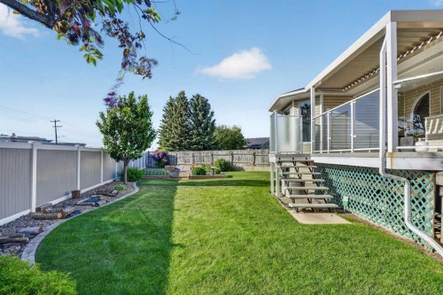 27 Cougar Bay North, Lethbridge, AB - Outdoor With Deck Patio Veranda