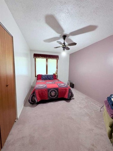 737 2 Street West, Cardston, AB - Indoor Photo Showing Bedroom