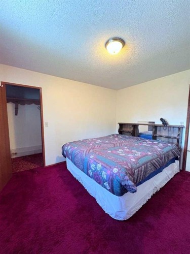 737 2 Street West, Cardston, AB - Indoor Photo Showing Bedroom