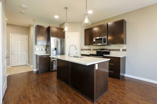59 Lasalle Road West, Lethbridge, AB - Indoor Photo Showing Kitchen With Double Sink With Upgraded Kitchen
