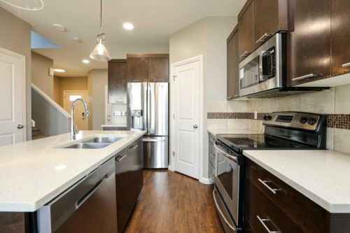 59 Lasalle Road West, Lethbridge, AB - Indoor Photo Showing Kitchen With Double Sink With Upgraded Kitchen