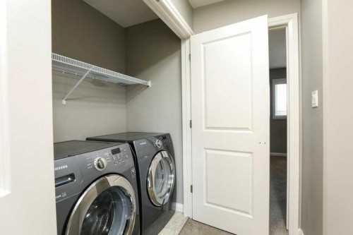 59 Lasalle Road West, Lethbridge, AB - Indoor Photo Showing Laundry Room