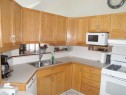 94 Heritage Lane West, Lethbridge, AB  - Indoor Photo Showing Kitchen With Double Sink 