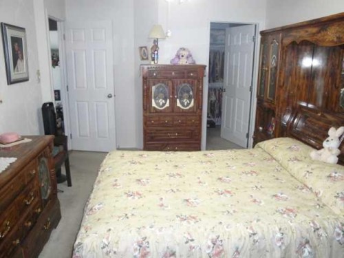94 Heritage Lane West, Lethbridge, AB - Indoor Photo Showing Bedroom