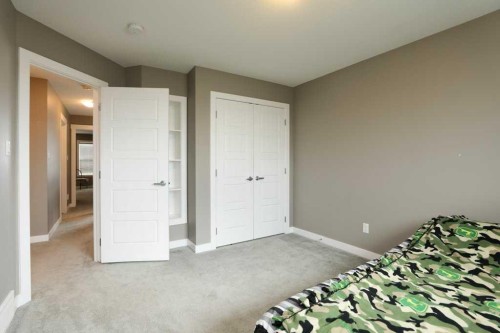 567 Moonlight Lane West, Lethbridge, AB - Indoor Photo Showing Bedroom