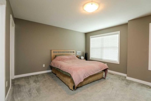 567 Moonlight Lane West, Lethbridge, AB - Indoor Photo Showing Bedroom