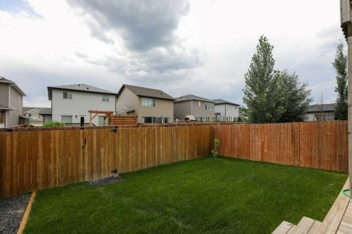 567 Moonlight Lane West, Lethbridge, AB - Outdoor With Backyard