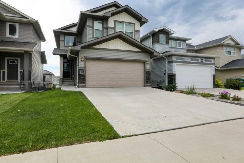 567 Moonlight Lane West, Lethbridge, AB - Outdoor With Facade