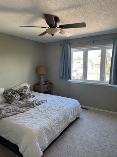 34 Riverbrook Close West, Lethbridge, AB - Indoor Photo Showing Bedroom