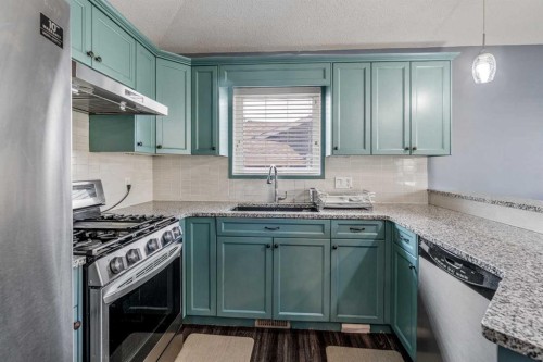 350 Mt Sunburst Way West, Lethbridge, AB - Indoor Photo Showing Kitchen With Upgraded Kitchen