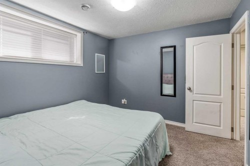 350 Mt Sunburst Way West, Lethbridge, AB - Indoor Photo Showing Bedroom
