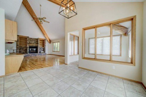 23 Niska Place West, Lethbridge, AB - Indoor Photo Showing Other Room With Fireplace