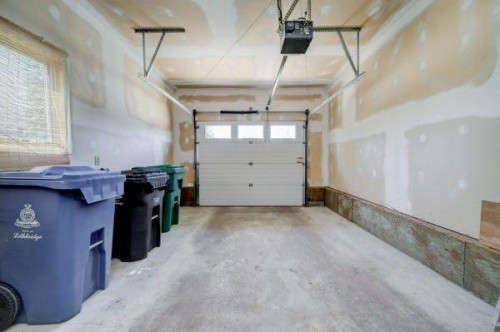 23 Niska Place West, Lethbridge, AB - Indoor Photo Showing Garage