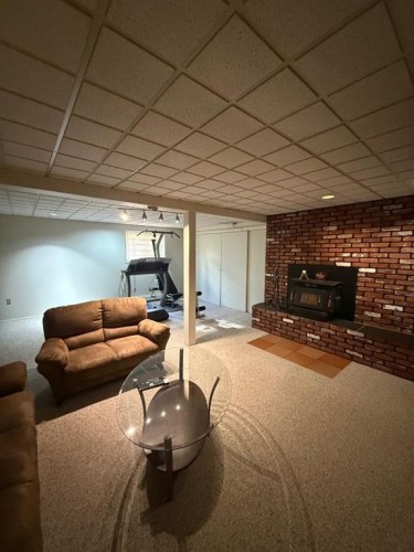 3733 21 Avenue South, Lethbridge, AB - Indoor With Fireplace