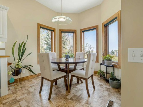 90013 212, Rural Lethbridge County, AB - Indoor Photo Showing Dining Room