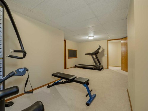 90013 212, Rural Lethbridge County, AB - Indoor Photo Showing Gym Room