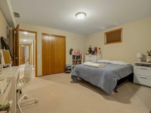 90013 212, Rural Lethbridge County, AB - Indoor Photo Showing Bedroom