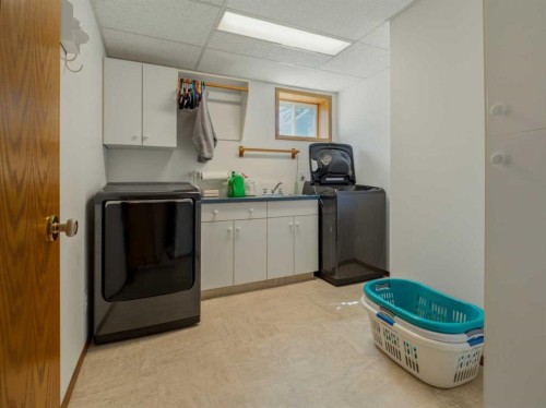 90013 212, Rural Lethbridge County, AB - Indoor Photo Showing Laundry Room