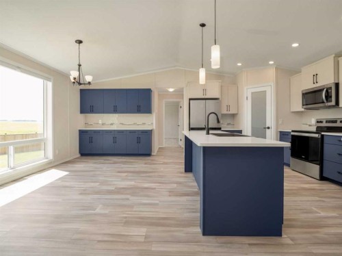2037 Sunflower Crescent, Coaldale, AB - Indoor Photo Showing Kitchen With Upgraded Kitchen