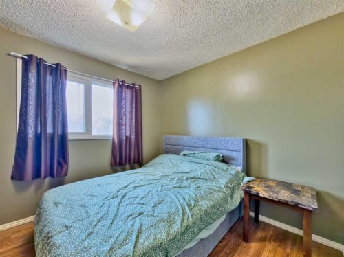 8534 21 Avenue, Coleman, AB - Indoor Photo Showing Bedroom